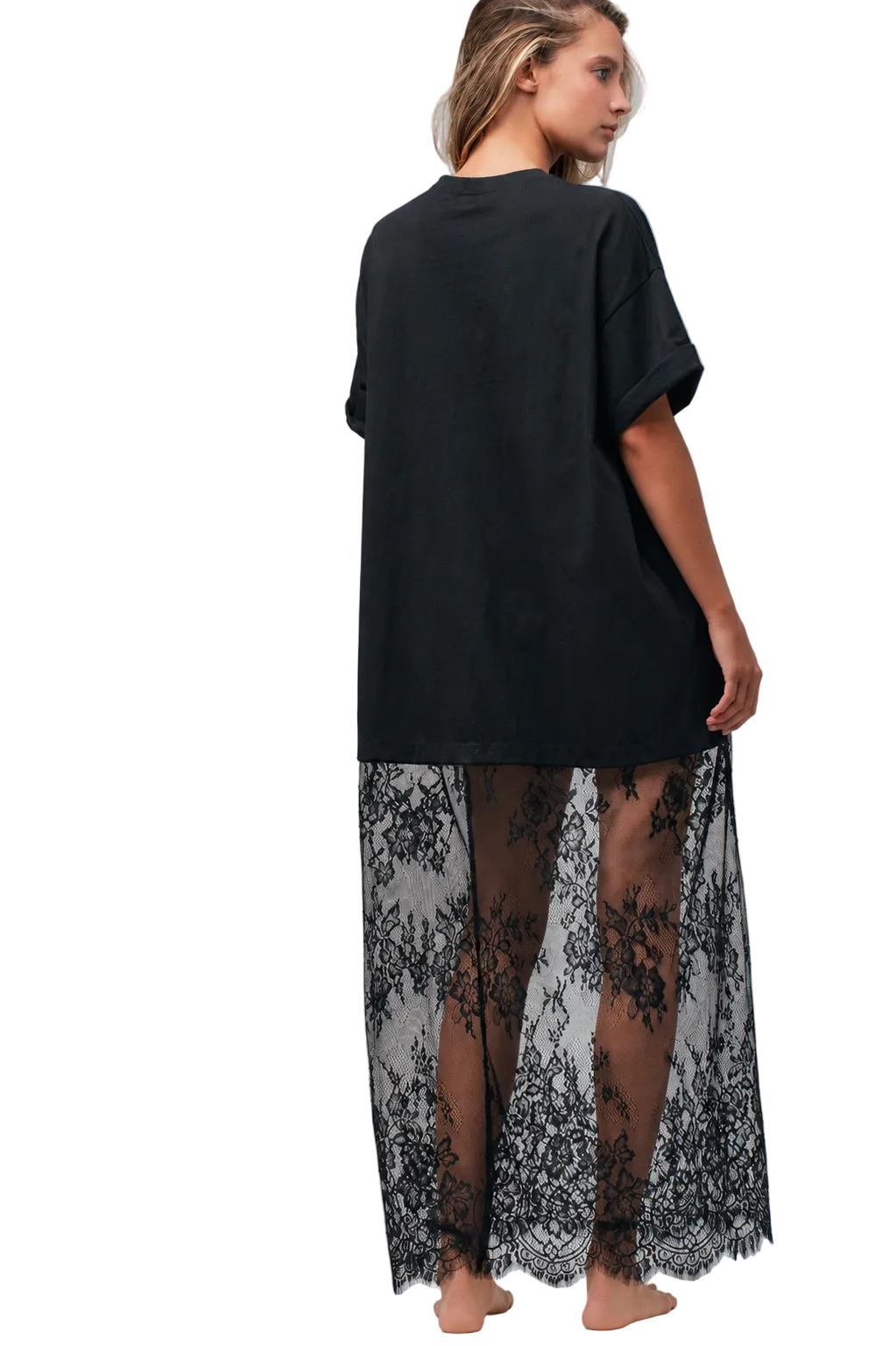 Woman wearing a black oversized t-shirt with sheer black lace 