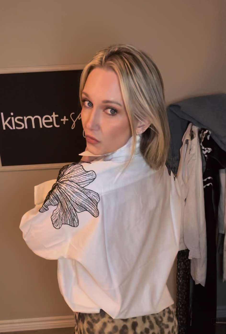 black and white lace detail blouse back view on lindsay in her office