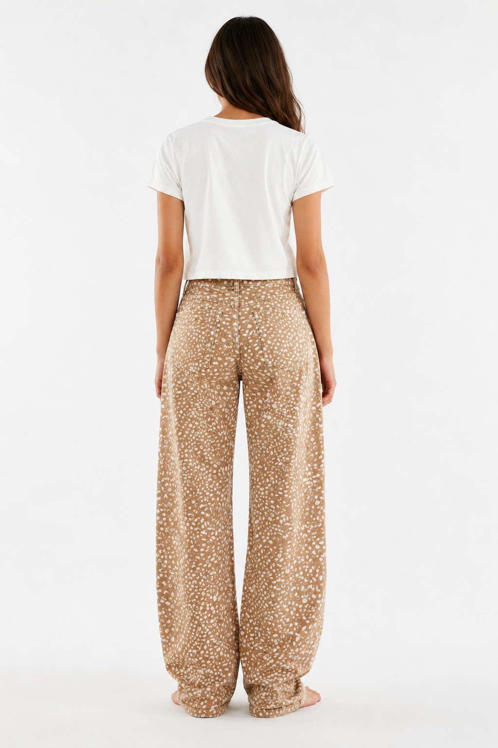 Back view of women's Fawn Print Wide-Leg Barrel Jeans featuring classic five-pocket styling, relaxed barrel-leg silhouette, and all-over fawn-inspired print.
