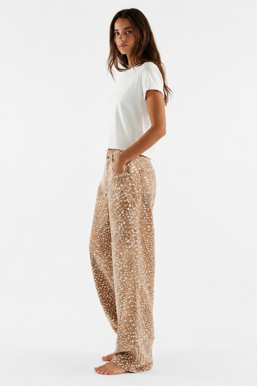 Side view of women's Fawn Print Wide-Leg Barrel Jeans showing the relaxed barrel-leg fit, full-length silhouette, and neutral fawn-inspired print.