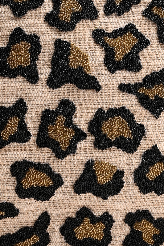 Close-up detail of hand-beaded leopard pattern on Luxe Leopard Jacquard Tote