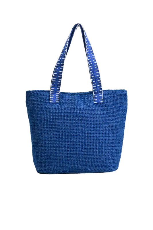 Blue no bad vibes tote bag with matching straps on a white background
