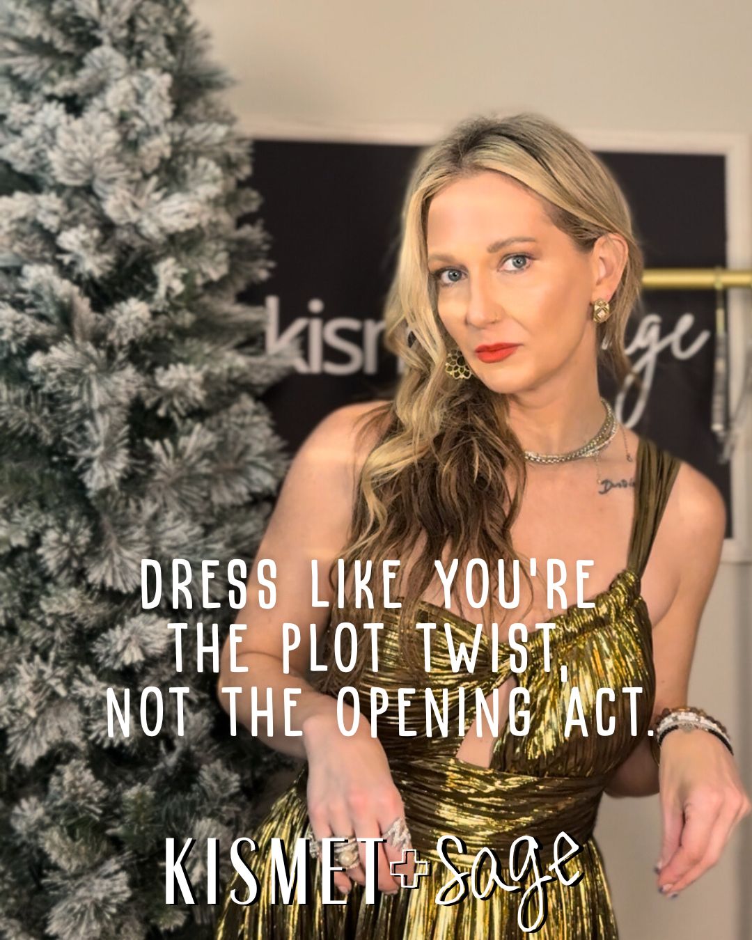 Woman in a gold dress with a Christmas tree and 'Kismet Sage' sign in the background